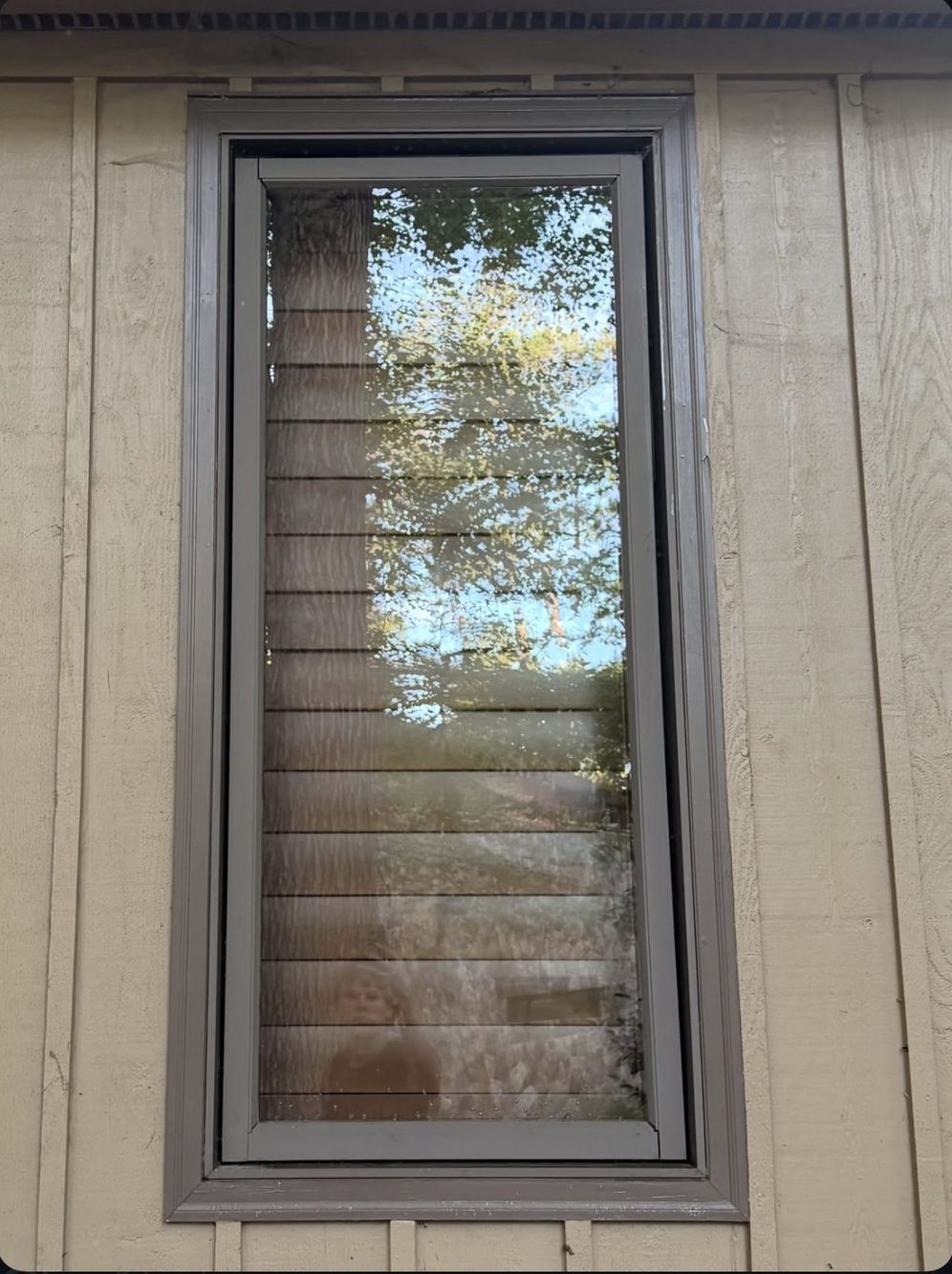 The same window after Webz pure-water cleaning, clear glass and clean frame